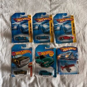 Lot Of 6 Hot Wheels Cars. New   Years range from 2004-2017. Great collectible.